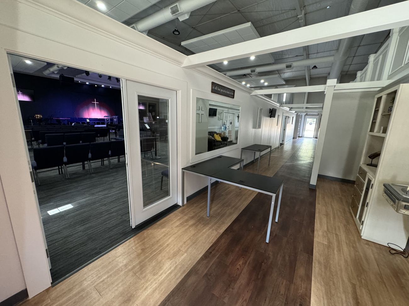 Hallway with glass doors leading to the sanctuary